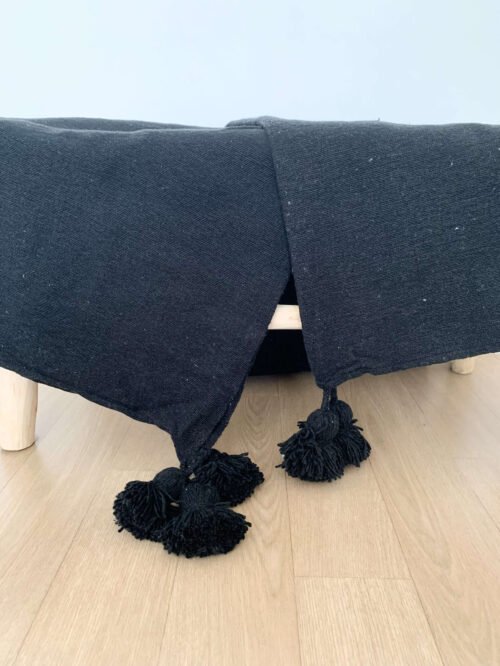 Plaid à pompons noir