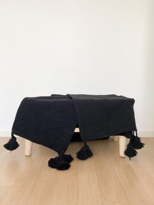 Plaid à pompons noir