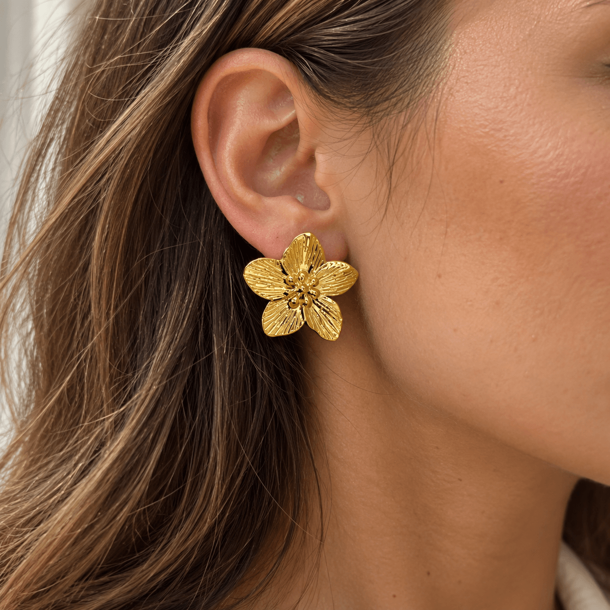 Boucles d’oreilles fleur doré