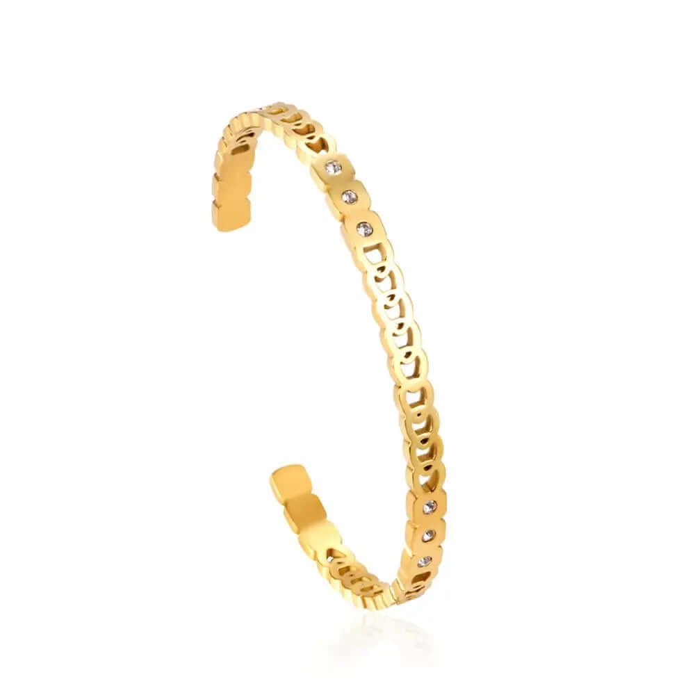 Bracelet doré a Trois Pierres