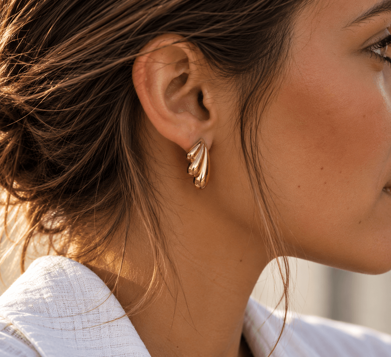 Boucles d'oreilles ailes dorées